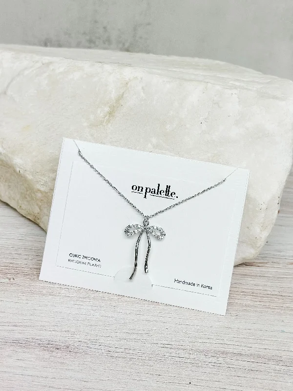 women eco-friendly necklaces -Crystal Bow Pendant Necklace - Silver